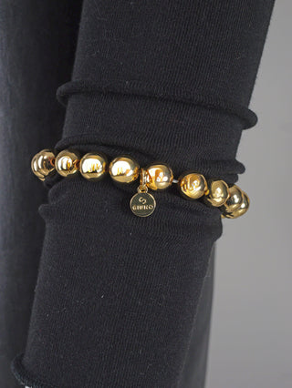 OFF#DLY Kugelarmband 7mm gold; glänzendes Aluminium, kugelförmiges Design, einheitliche Größe. Elegantes Accessoire, ideal für stilvolle Akzente.