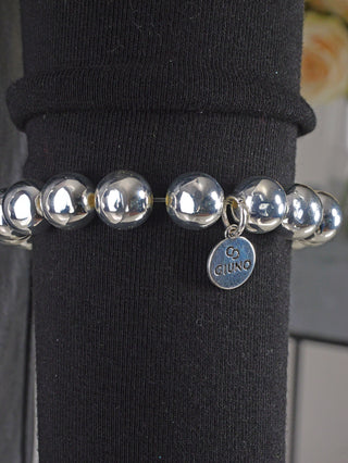OFF#DLY Kugelarmband 10 mm silber auf schwarzem Untergrund, mit glänzenden Silberkugeln und feiner Verarbeitung, aus Aluminium, hochglanzbeschichtet, präsentiert als modisches Accessoire.