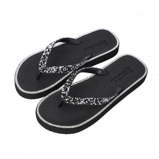 Mooílo Flipis ANNA black: Ein Paar schwarze Flip-Flops mit ultraweicher, dämpfender Sohle und fester Untersohle, die maximalen Komfort und ein natürliches Barfußgefühl bieten. Ideal für hohen Tragekomfort.