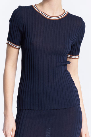 Lumina Strickshirt marine: Fein geripptes Kurzarm-Top mit Rundhalsausschnitt und kontrastierenden Bündchen. Figurbetont durch elastisches Material, passend für Größen 34-40. Ideal für sportliche oder feminine Outfits.