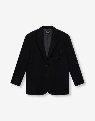 ALIX Grandad Blazer black: Schwarzer, zweiknöpfiger Oversized-Blazer mit markanten Schulterpolstern, Notch-Lapels, abnehmbarer Perlenkette an der Brusttasche und subtilen Stickereien, ideal für moderne, elegante Looks.