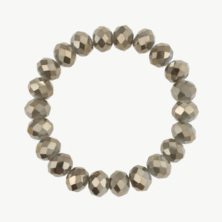 Flaches Kristallperlen Armband grau 231: Ein elastisches Armband aus grau-silbernen, facettierten Kristallperlen. Die Perlen sind rund und metallisch glänzend, vereint in einem eleganten, freien Design.