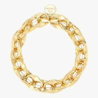 Elastisches Armband gold mit polierten, ineinandergreifenden ovalen Gliedern und einem kleinen runden Tag mit „GIUNO“-Prägung am Verschluss. Hergestellt aus Legierung und Aluminium, Einheitsgröße.