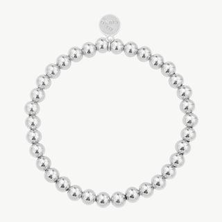Einfaches OFF#DLY Armband Kugel 6 mm silber aus polierten Silberton-Metallperlen, elastisch aneinandergereiht, mit kleinem flachem Anhänger nahe dem Verschluss, aus Kupfer, in freier Größe.